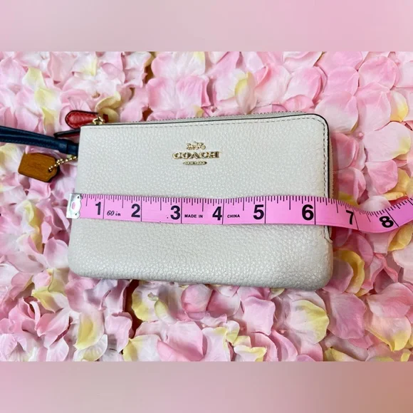 COACH Double Zipper Wristlet
Clutch Tan cream and blue Pebble Leather - Picture 9 of 12